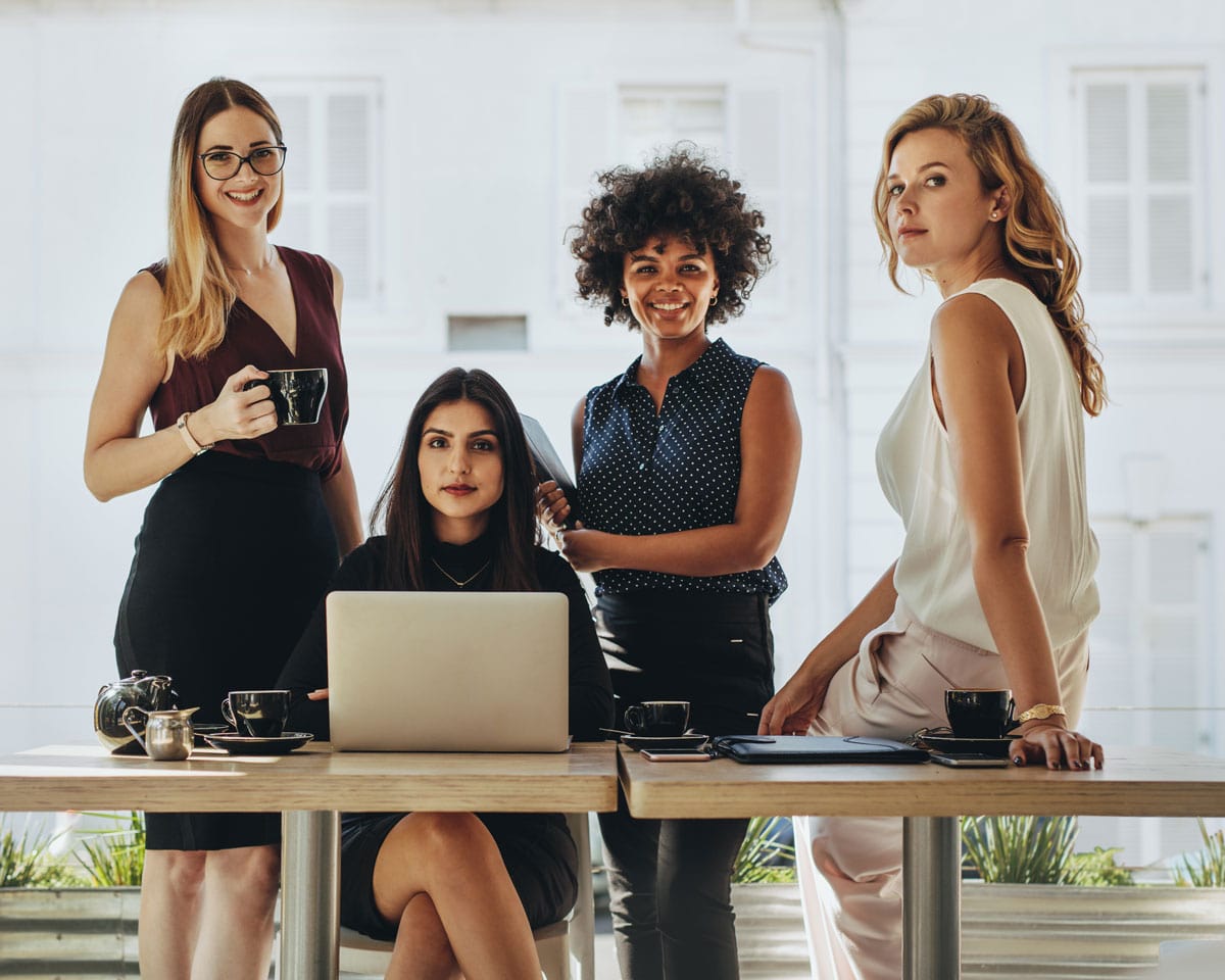 Empowered women engaging in leadership training – Leadership Development for Women.